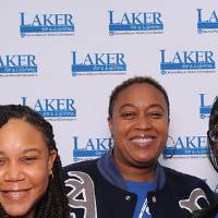 Three women smiling with each other